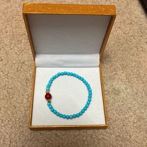 Turquoise and Red Beaded Bracelet